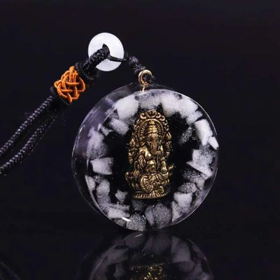 Ciondolo in orgonite e ossidiana del Dio protettore.