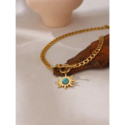 Collar con colgante de sol de turquesa