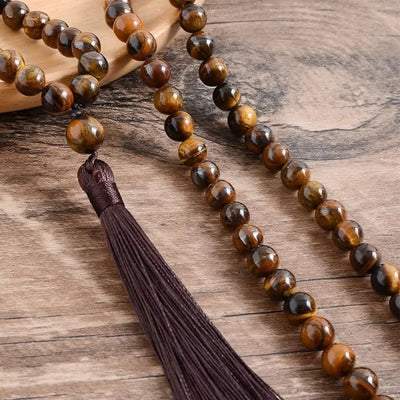 Conjunto de collar y pulsera con ojo de tigre y ónix