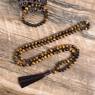 Conjunto de collar y pulsera con ojo de tigre y ónix