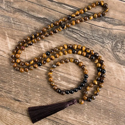 Conjunto de collar y pulsera con ojo de tigre y ónix