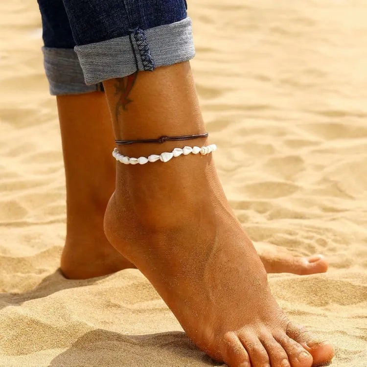 Juego de pulseras de concha y polipiel