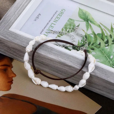 Juego de pulseras de concha y polipiel