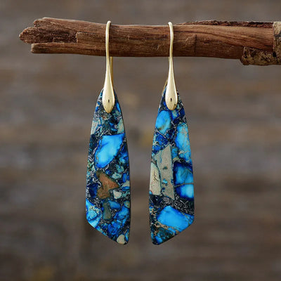 Pendientes Geométricos de Labradorita y Malaquita: Protección y Transformación
