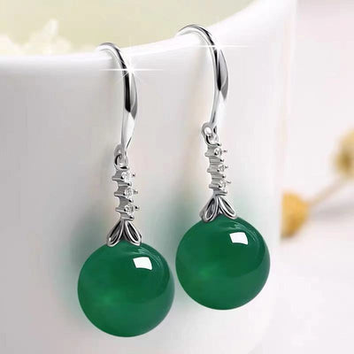 Pendientes largos de turmalina verde: Luz, energía y protección espiritual
