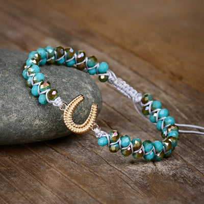 Pulsera de Cristal Checo con Amuleto de Herradura Dorada