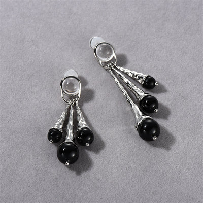 Energía protectora y estilo: Pendientes de obsidiana negra para mujer