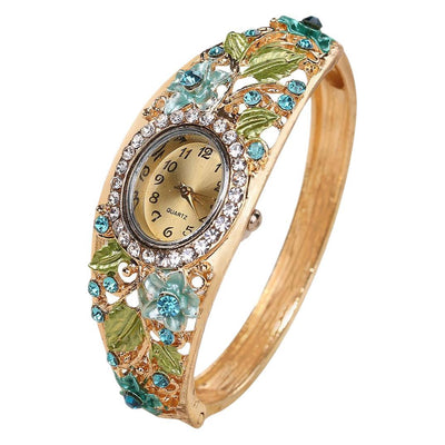 Reloj de Cuarzo Verde con Flor de Diamante y Set de Joyas de Perlas: Elegancia y Energía en tu Día