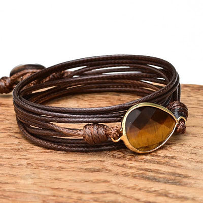 Pulsera envuelta en cuerda de parafina con colgante de ojo de tigre