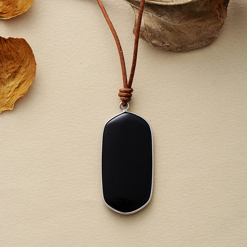 Protección y Equilibrio: Colgante Geométrico de Piedra Natural