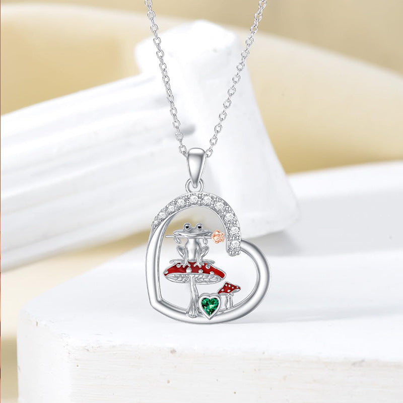 Collar corazón con rana y hongo en plata 925, joya mágica y original
