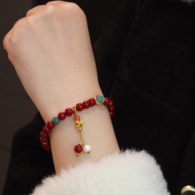Pulsera de energía vital con cinabrio y jadeíta: protección y armonía
