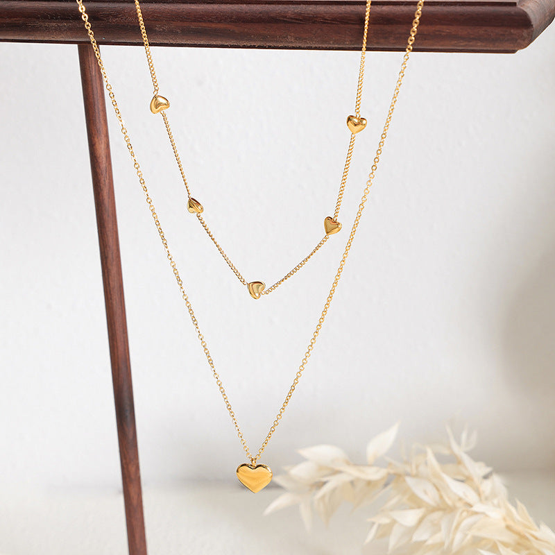 Collar Corazón Doble: Amuleto de Amor y Protección