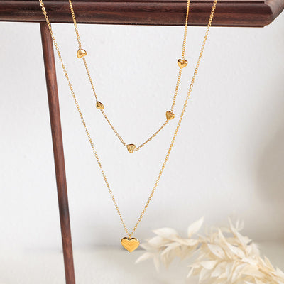 Collar Corazón Doble: Amuleto de Amor y Protección