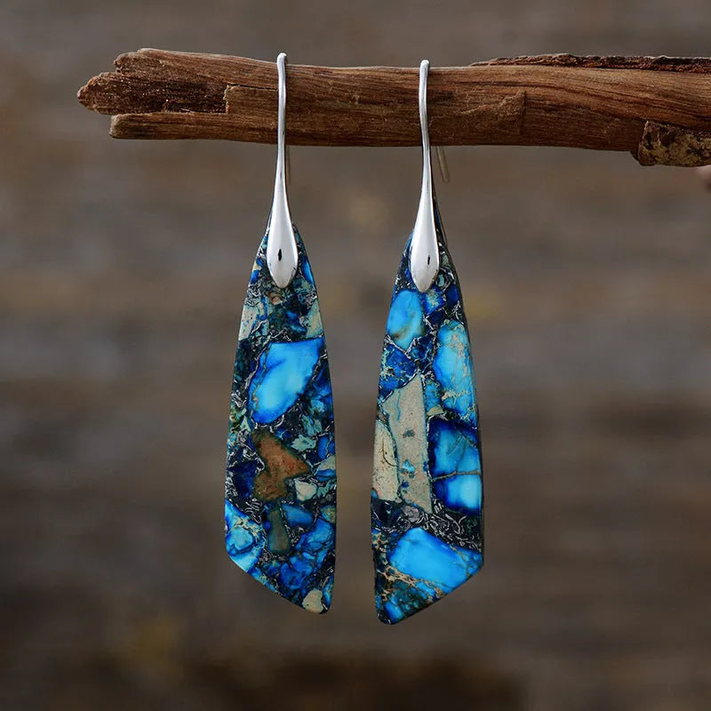 Pendientes Geométricos de Labradorita y Malaquita: Protección y Transformación