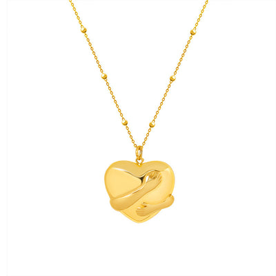 Collar de Titanio con Colgante Amor: Protección y Conexión Emocional