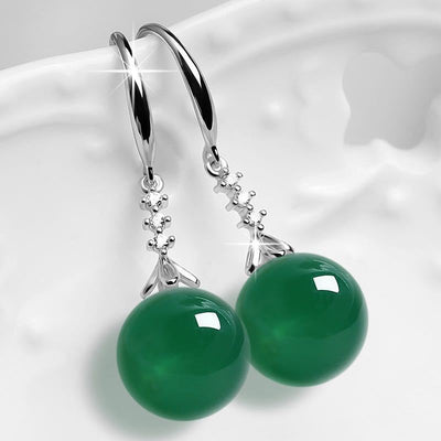 Pendientes largos de turmalina verde: Luz, energía y protección espiritual