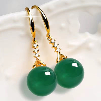 Pendientes largos de turmalina verde: Luz, energía y protección espiritual
