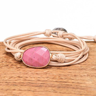 Pulsera envuelta en cuerda de cera con colgante de rhodonita