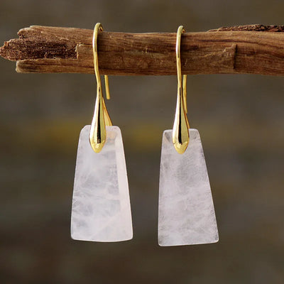 Pendientes colgantes de cuarzo blanco: Luz y pureza para tu día a día
