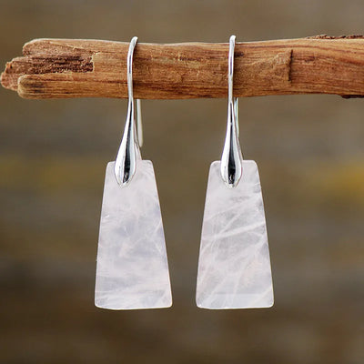 Pendientes colgantes de cuarzo blanco: Luz y pureza para tu día a día
