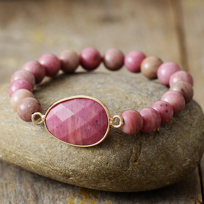 Pulsera artesanal de rodocrosita: vitalidad y equilibrio diario