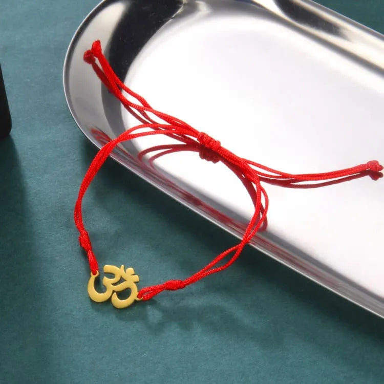 Pulsera budista con el símbolo OM