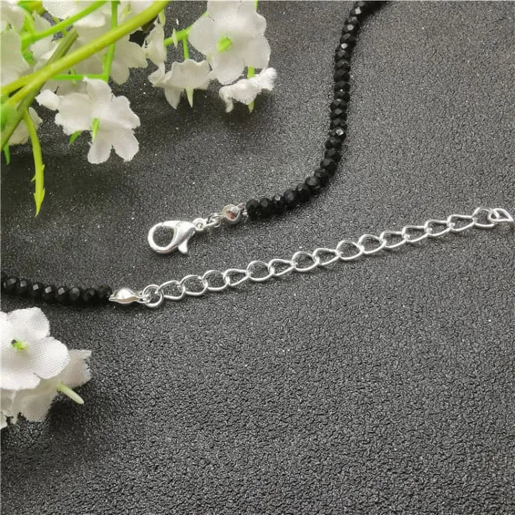 Tobillera de mujer con piedras negras de cristal