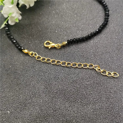 Tobillera de mujer con piedras negras de cristal