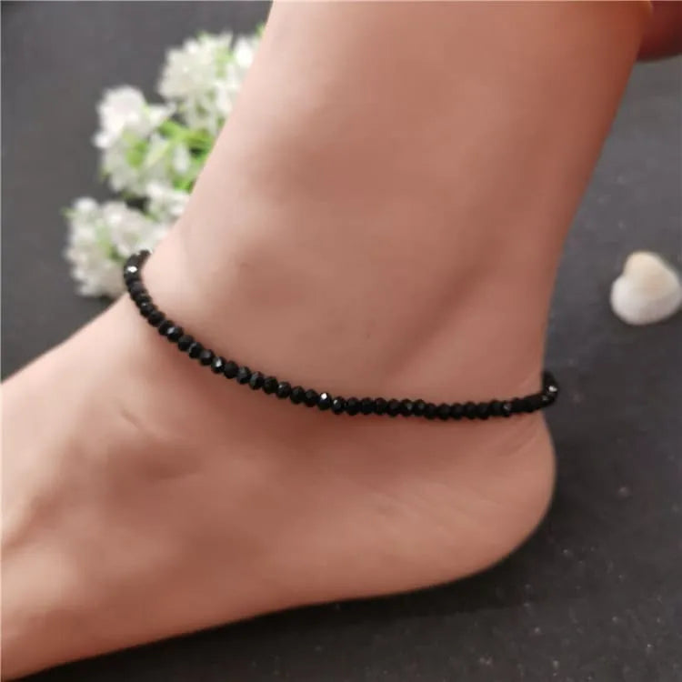 Tobillera de mujer con piedras negras de cristal